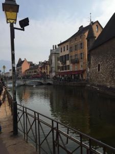 [Picture of the city] Caption: Annecy felt like the perfect historic little town, each building had its own character.