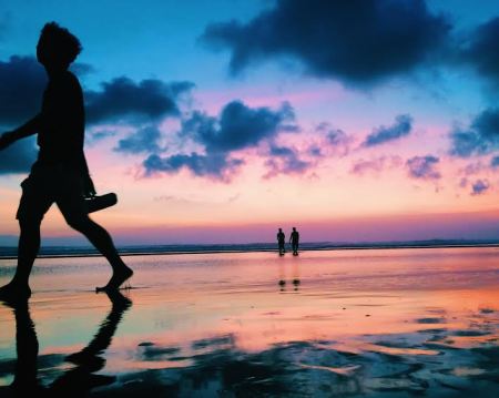 The day was wrapped up in shades of orange, purple, and blue as we watched the sun set on the beach.