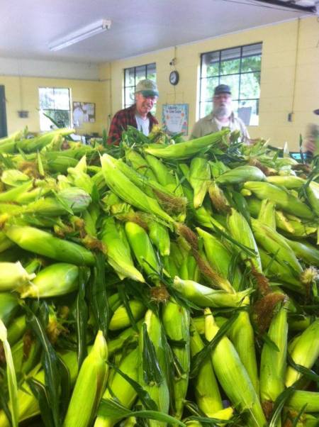 My dad at the corn wagon in the summer